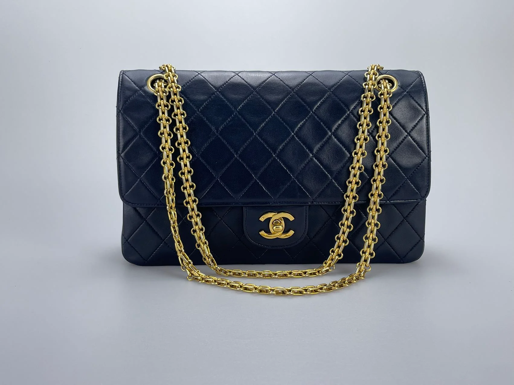 used-Chanel Black Vintage Medium Classic Double Flap Bag with 24K Gold Hardware-MILOURA