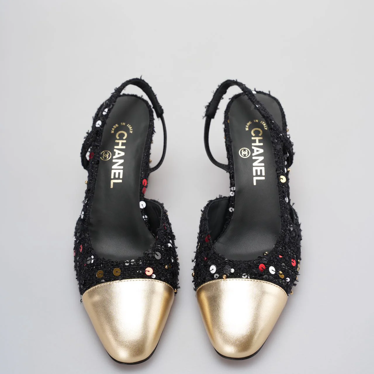 used-Chanel Tweed Lambskin Sequin Cap Toe CC Slingback Pumps size 39 in Black and Gold-MILOURA