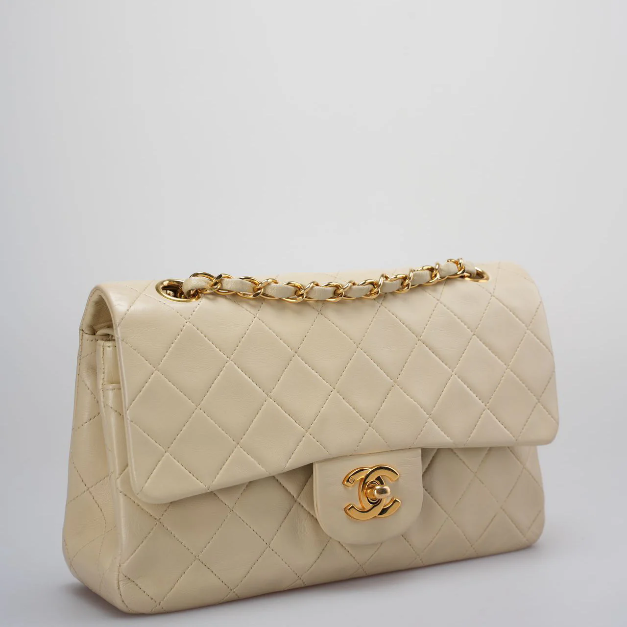 used-Chanel Vintage Beige Quilted Leather small timeless Double Flap Bag with 24K Gold Hardware-MILOURA