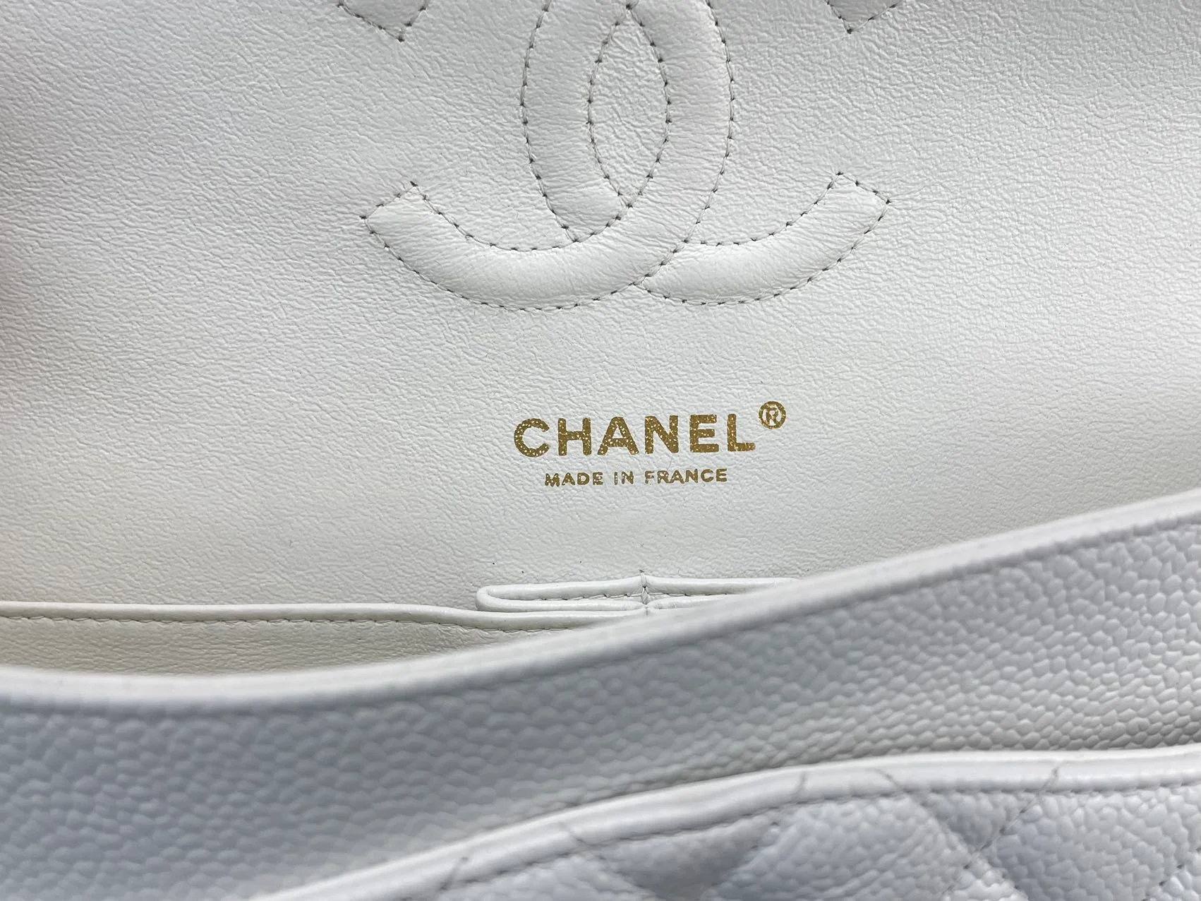 used-Chanel Medium White Classic Flap Bag in Caviar Leather with Gold Hardware-MILOURA