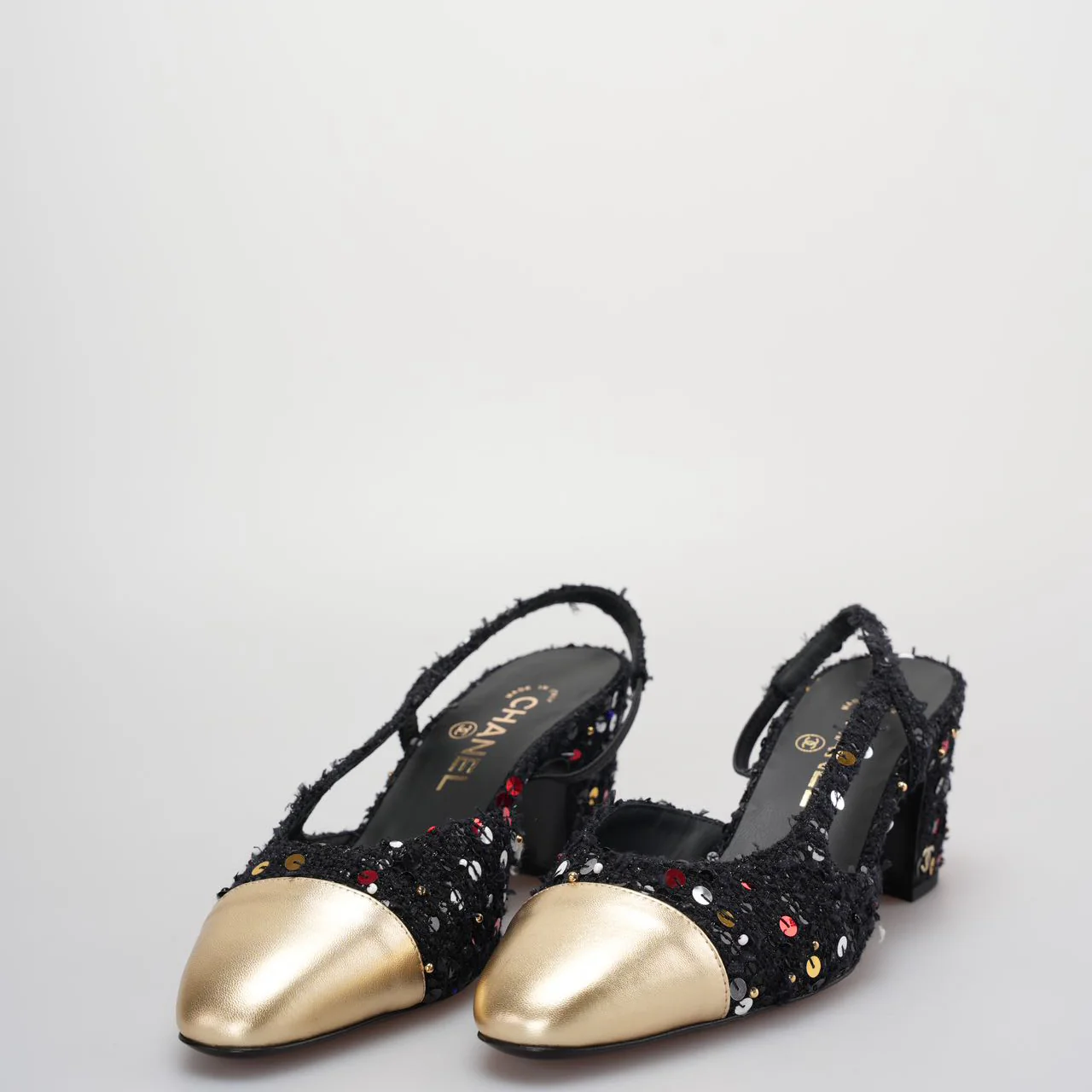 used-Chanel Tweed Lambskin Sequin Cap Toe CC Slingback Pumps size 39 in Black and Gold-MILOURA