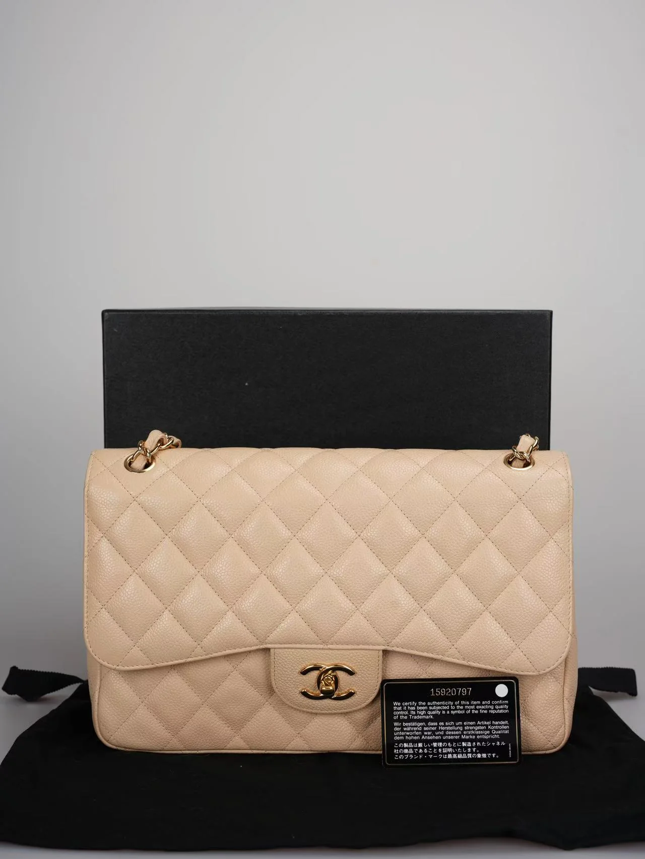used-Chanel Beige Jumbo timeless Flap Bag Caviar Leather with Gold Hardware-MILOURA