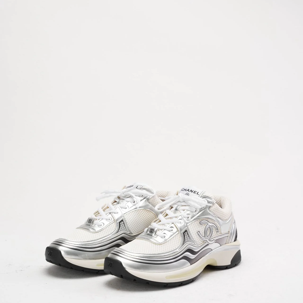 Chanel CC Logo Sneaker in White and Silver 40.5