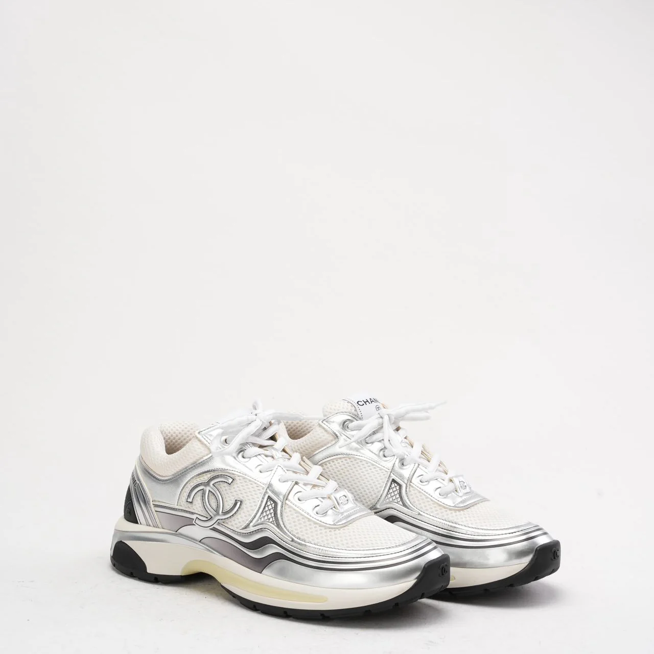 Chanel CC Logo Sneaker in White and Silver 40.5