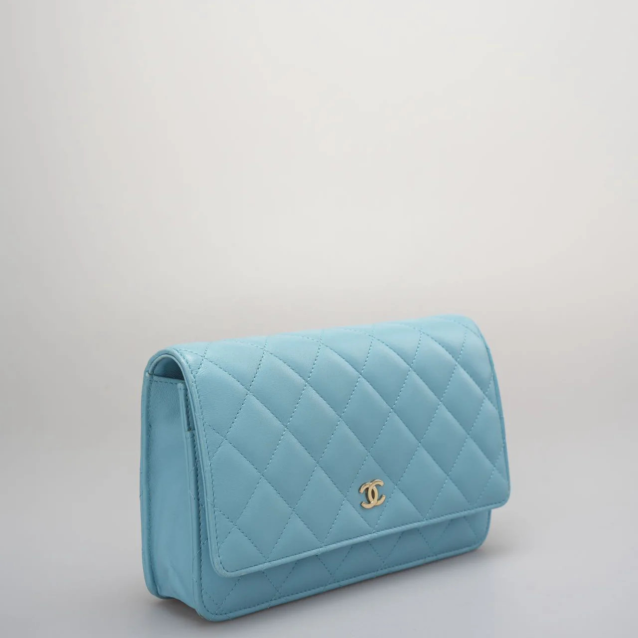 Used authentic Chanel light blue woc bag