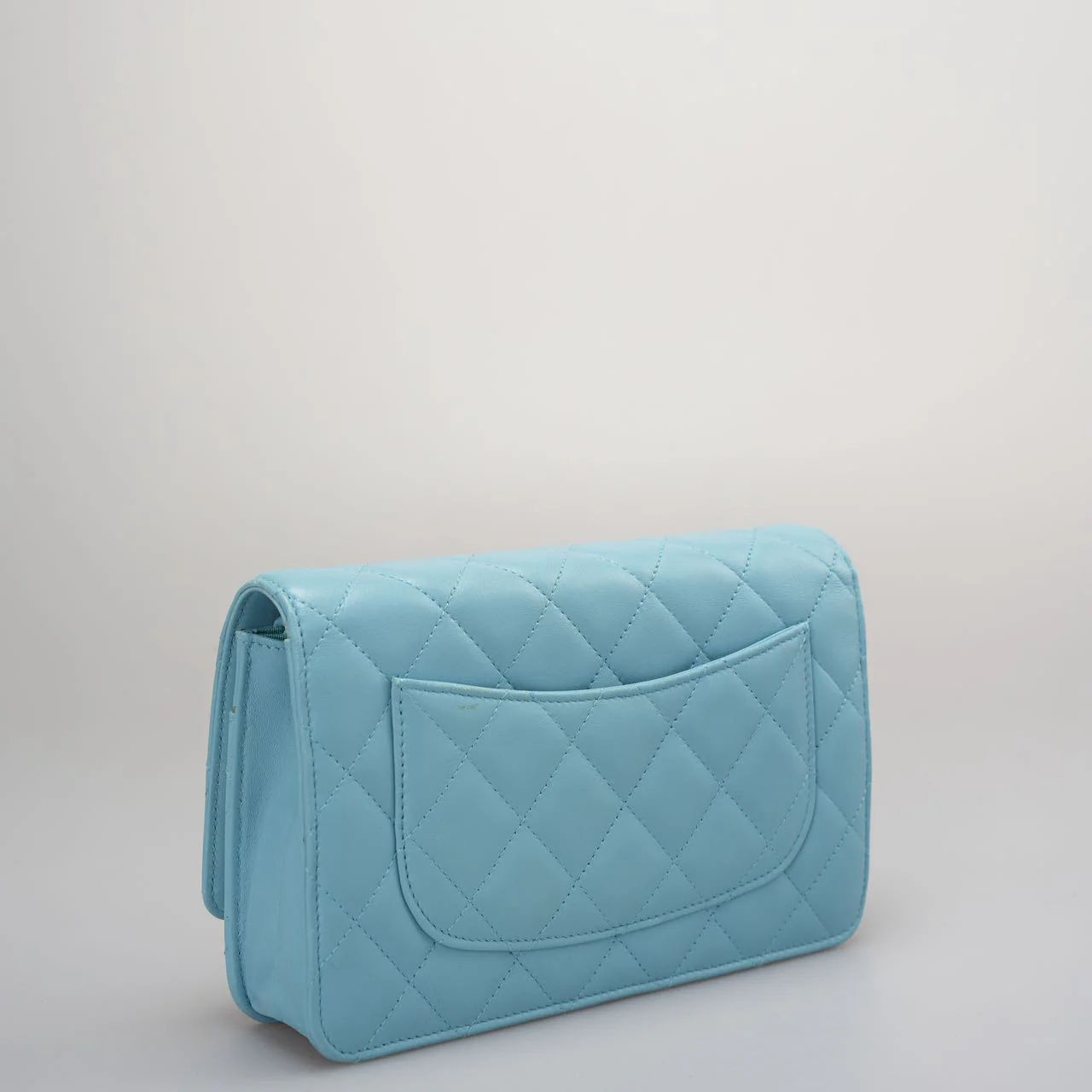 Used authentic Chanel light blue woc bag