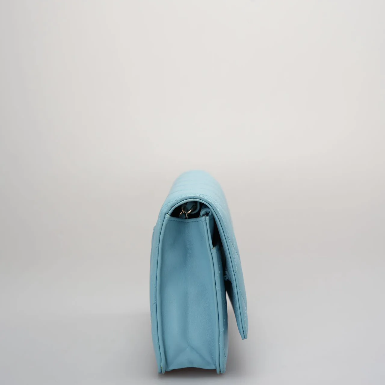 Used authentic Chanel light blue woc bag