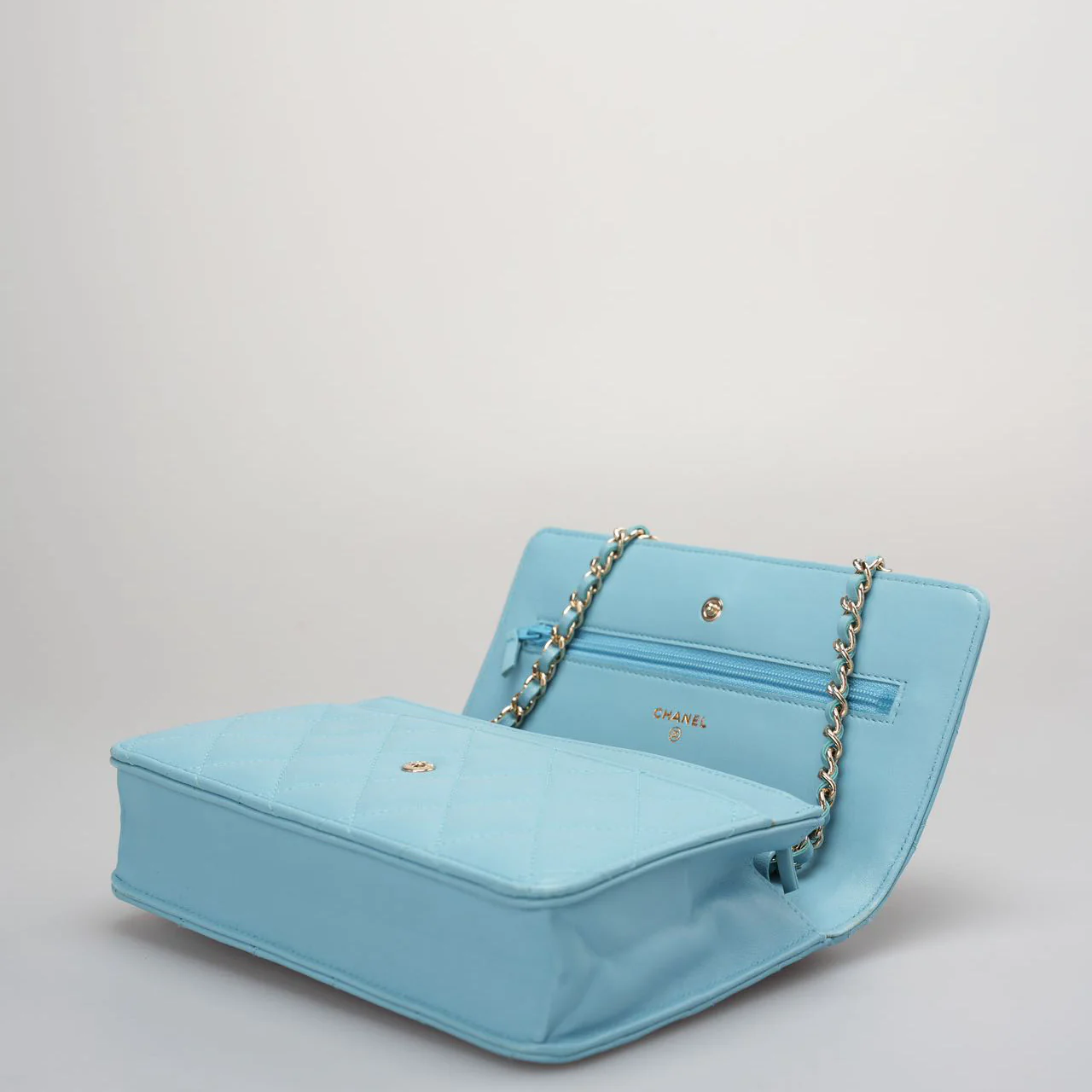 Used authentic Chanel light blue woc bag