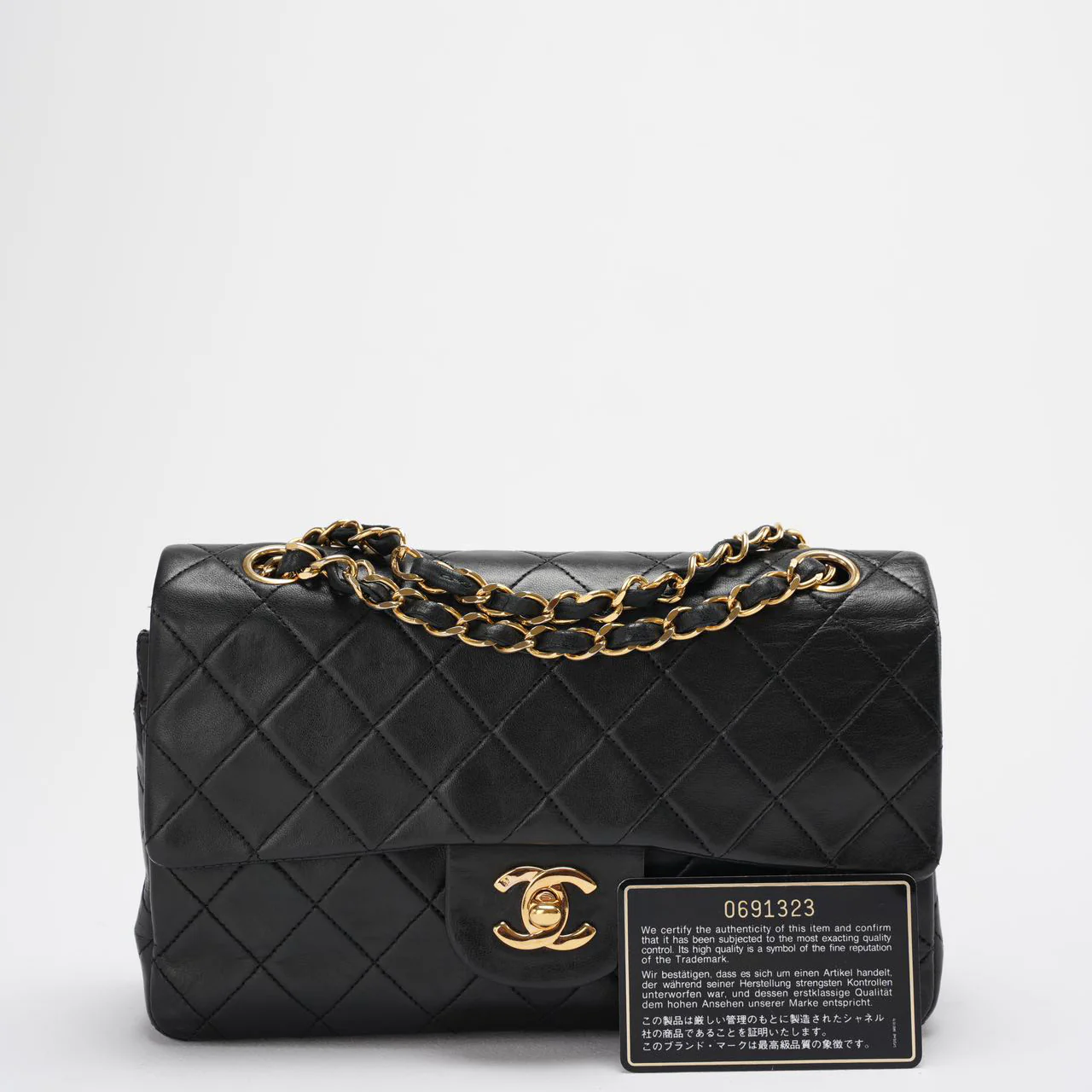 Chanel Vintage Classic Timeless Flap Bag  Black Lambskin with 24K Gold Hardware (Rare)