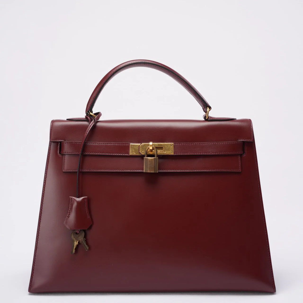 Vintage Hermès Kelly 32 aus burgunderrotem Box-Leder (1985)