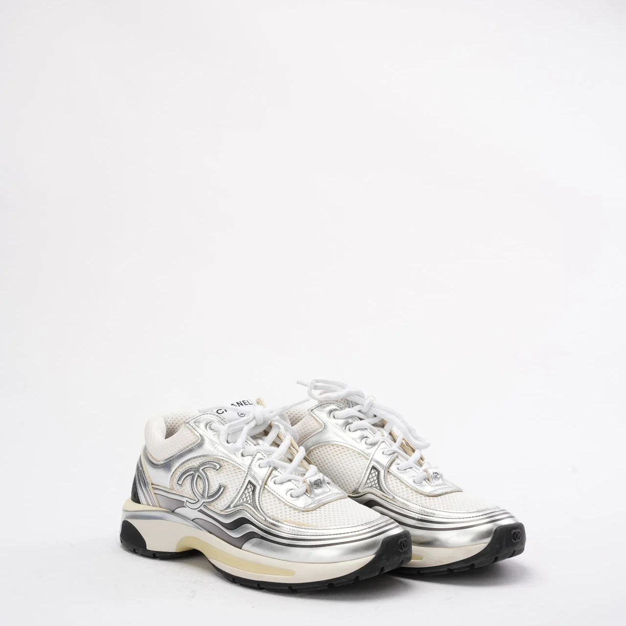 Chanel CC Logo Sneaker in White and Silver 38.5