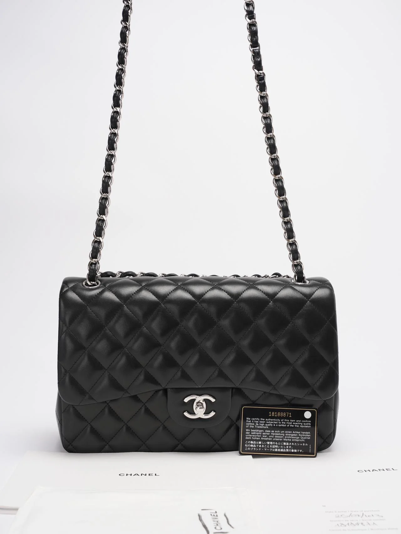 Chanel Classis Flap Bag Lambskin Black Bag Jumbo in Silver Hardware Second hand miloura 