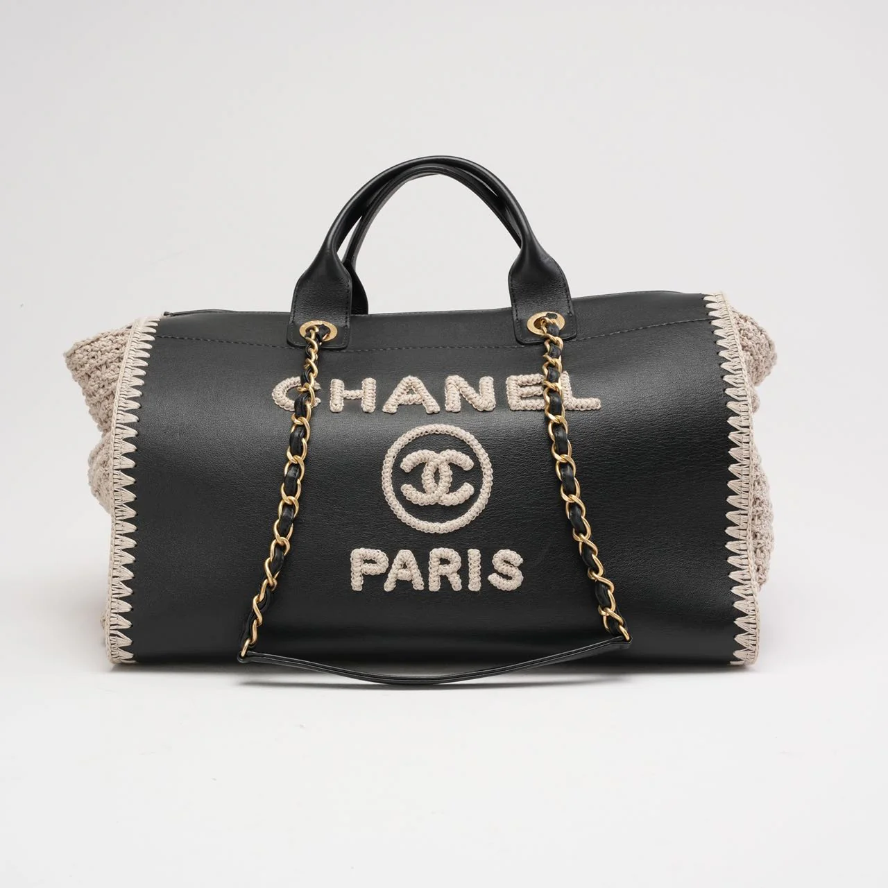 Sac cabas Chanel Deauville grand modèle en cuir de veau noir/beige